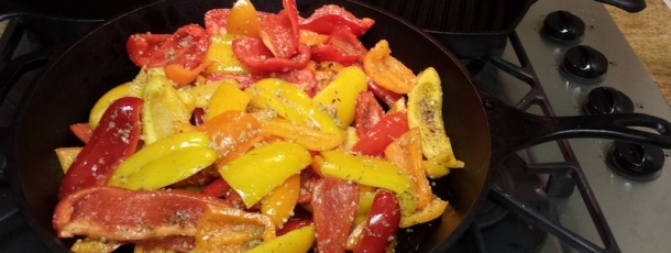PEPPERS IN SKILLET JUST BEFORE ENTERING OVEN FOR ROASTING PROCESS